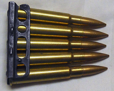 five rounds of .303 British ammunition in a Lee-Enfield charging clip